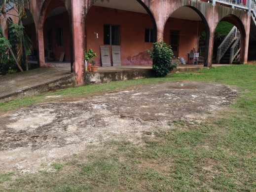This is interesting. a a mound of dried cement next to our house. Apparently, they don't have cement mixers here, so they just make a big ol' blob of cement on the ground next to the construction site, and mix it up right there. It makes a nice spot to park your car later...