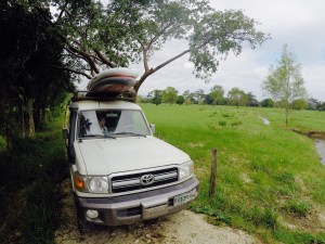 This is us, out in a field, trying really hard to get Peter's rig stuck in muddy cow poo.