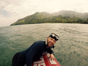 Ryan, catching a breather on the paddle board while hunting for fish.