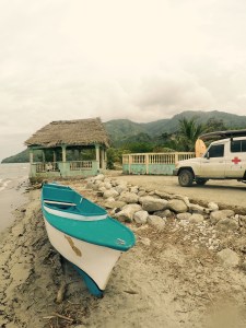 We parked here and went out toward the reef.  The two young men who owned this fishing boat, were hanging out here, shooting the breeze.  